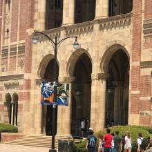 Trumpet and Sousaphone Banner in front of Royce Hall